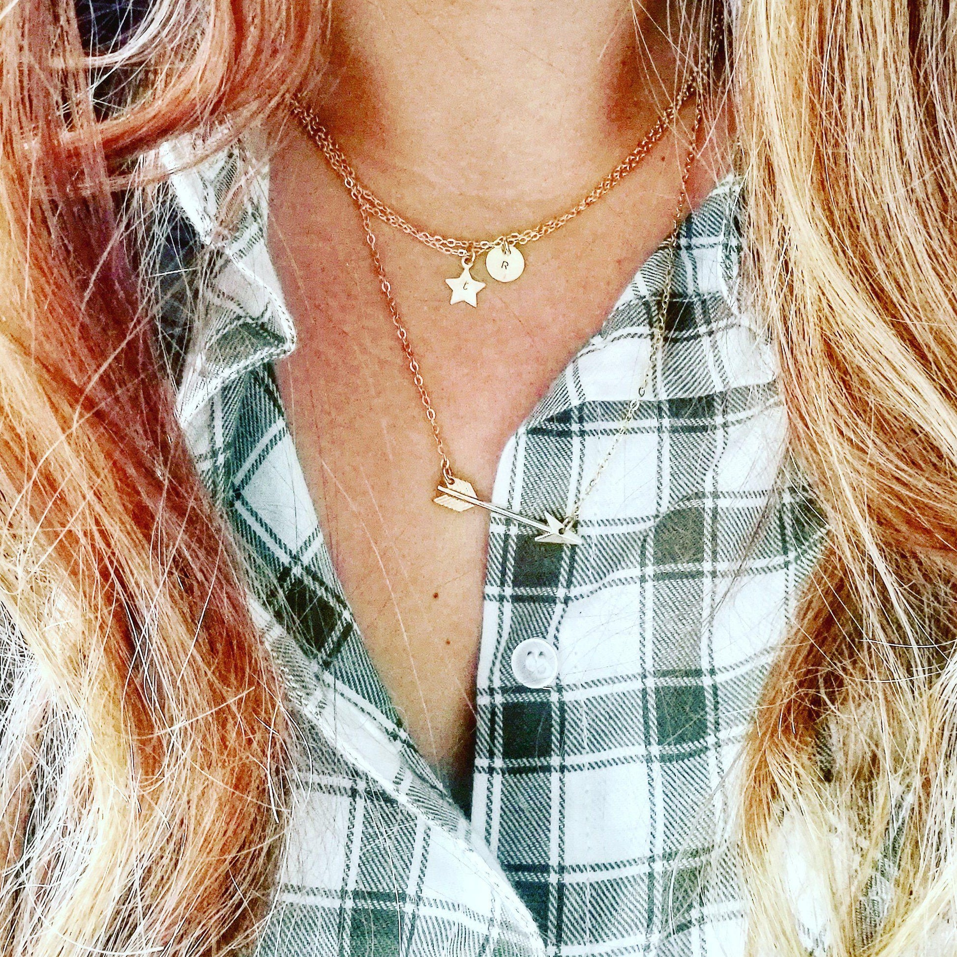 initiaal ketting en pijl ketting
